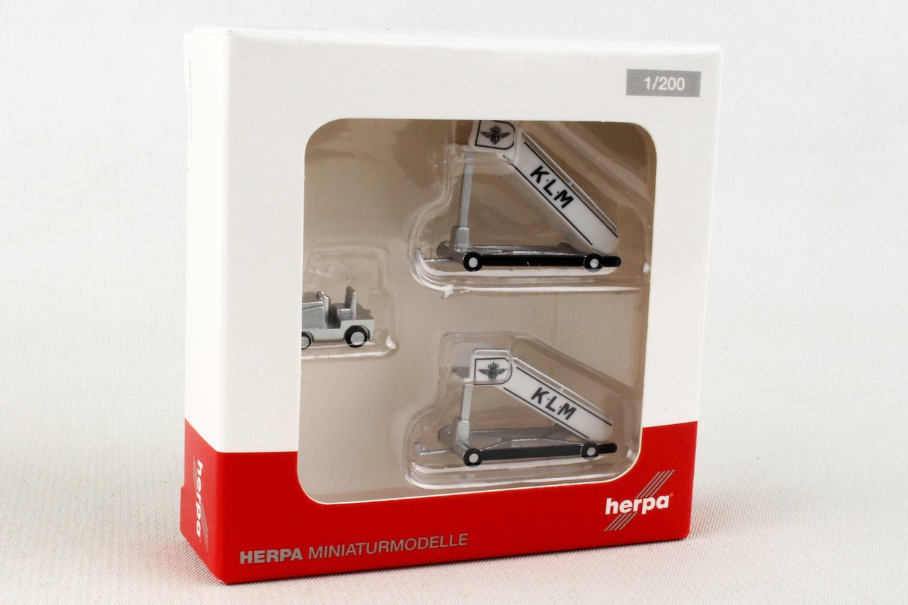 Herpa Wings 571883 1:200 KLM historic passenger stairs (2) with tractor (1)