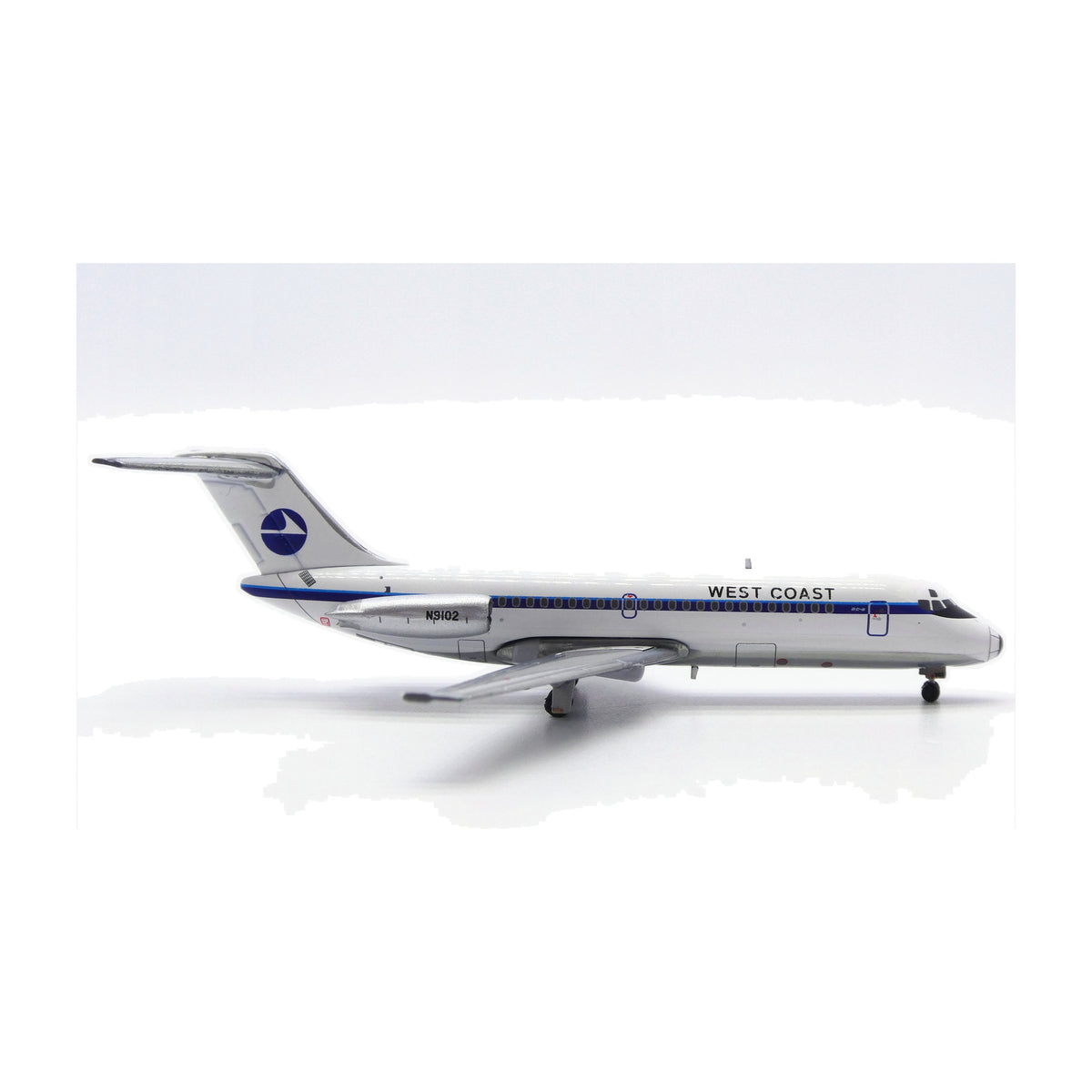V1:400 1:400 scale West Coast Airlines DC-9-14 N9102 diecast model - left side profile
